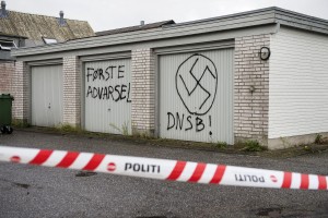 Swastika signs are seen on the walls of the Red Cross asylum center in Lyngbygaard, in Trustrup, in the west of Denmark August 27, 2015. The asylum center was vandalized by unidentified men, who drew Nazi symbols and wrote a message reading "first warning", on Wednesday night. A vehicle was also set on fire outside the center. Police told local media, it was a the third time the asylum center was targeted by vandals with an apparent political motive. REUTERS/ Bo Amstrup/Scanpix Denmark ATTENTION EDITORS - THIS IMAGE WAS PROVIDED BY A THIRD PARTY. FOR EDITORIAL USE ONLY. NOT FOR SALE FOR MARKETING OR ADVERTISING CAMPAIGNS. THIS PICTURE IS DISTRIBUTED EXACTLY AS RECEIVED BY REUTERS, AS A SERVICE TO CLIENTS. DENMARK OUT. NO COMMERCIAL OR EDITORIAL SALES IN DENMARK. NO COMMERCIAL SALES.