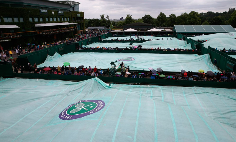 La lluvia dijo presente y suspendió varios partidos en Wimbledon