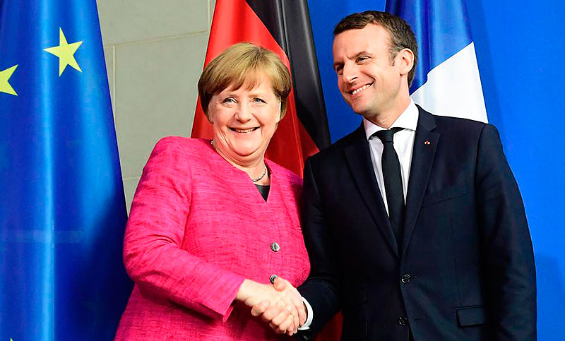Macron recibió a Merkel en París con un reportaje donde declaró «disfuncional» a la zona euro
