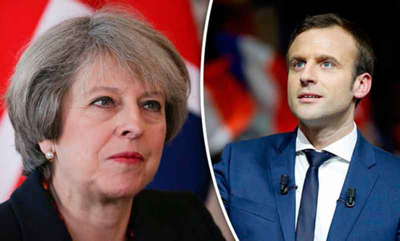 May y Macron afrontan críticas de la oposición por el ataque a Siria