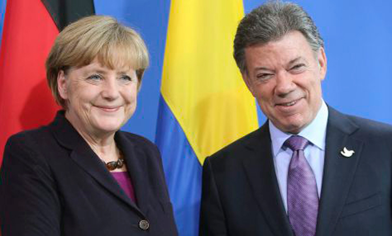 Santos y Merkel se comprometen a trabajar por la paz y la reconciliación