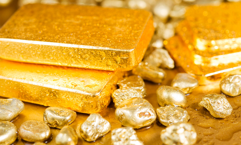 Un dólar débil hizo que los precios del oro subieran a un pico de más de una semana
