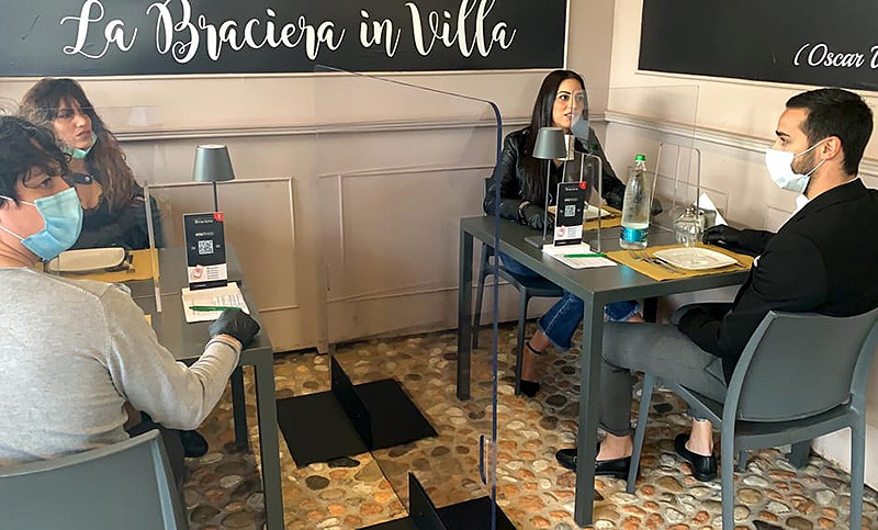 Con medidas estrictas de higiene, Italia abrió bares y negocios tras más de dos meses