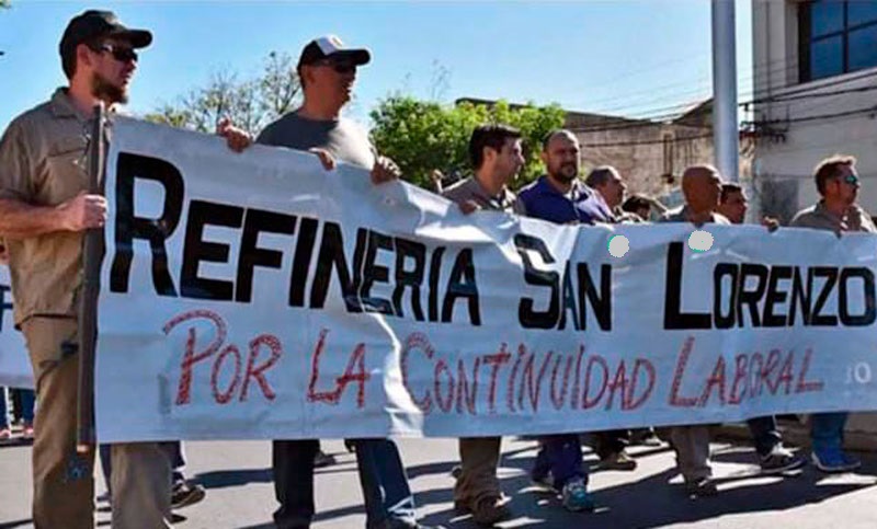 Vigiladores privados lanzaron un plan de lucha en Refinería San Lorenzo tras el despido de siete empleados